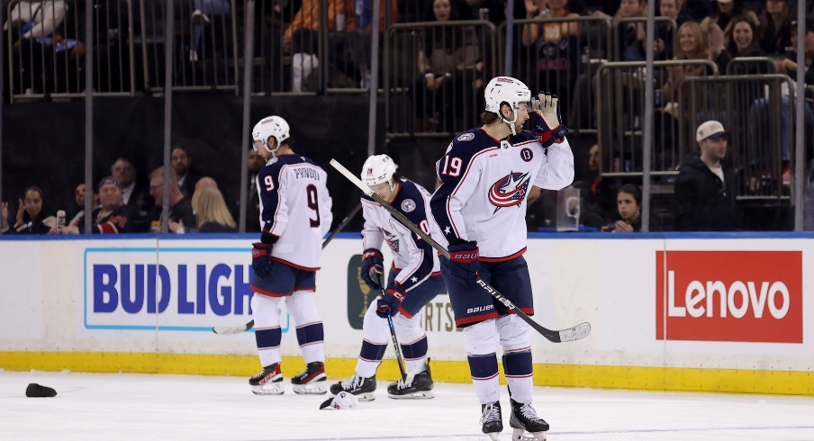 A hat lands on the ice as Columbus Blue Jackets center Adam Fantilli (19) celebrates his hat trick against the New York Rangers during the third period at Madison Square Garden.