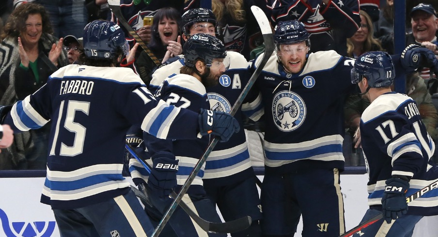 Columbus Blue Jackets center Mathieu Olivier (24) celebrates his goal against the New Jersey Devils during the third period at Nationwide Arena.